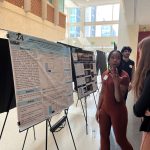 EJ Clinic student Kareemah McQueen presenting her poster at the UNC Undergraduate Research Symposium